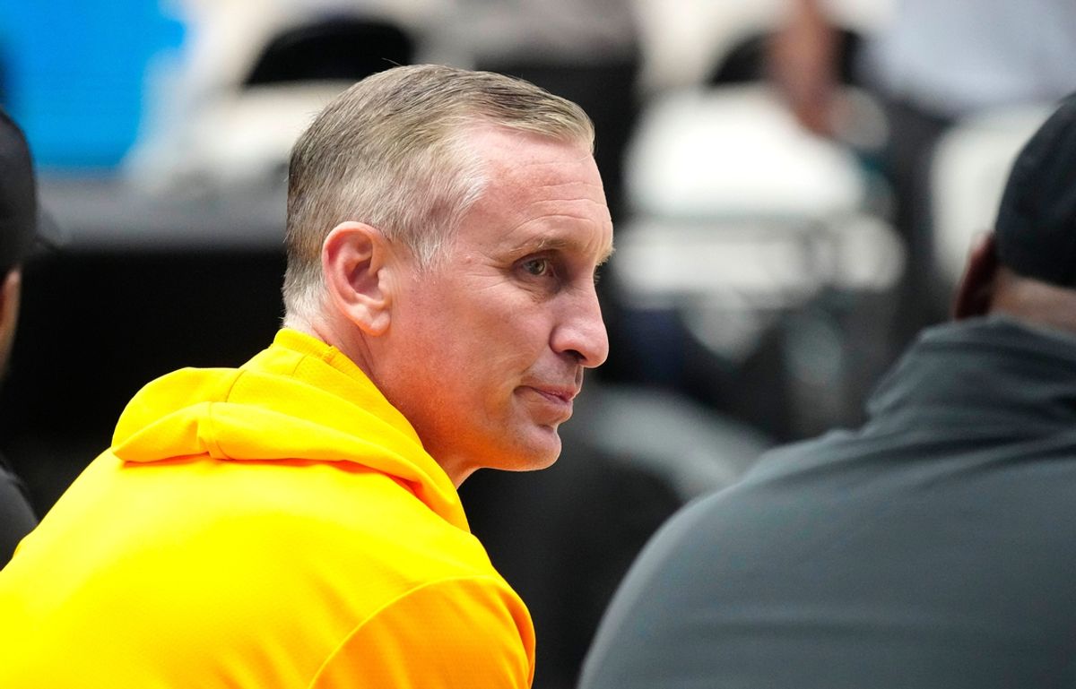 ASU head coach Bobby Hurley talks with other coaches on the sideline of a game during the Section 7 basketball tournament at State Farm Stadium in Glendale on Friday, June 21, 2024.