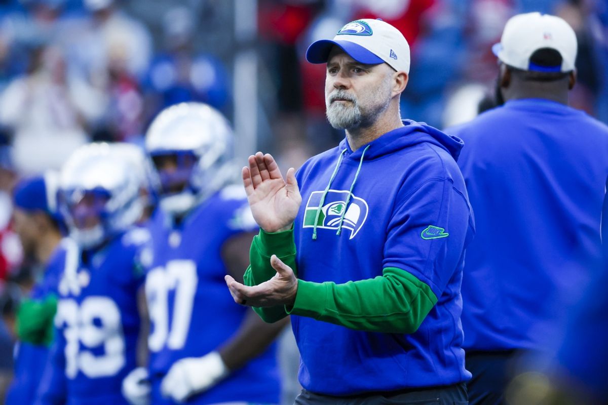 Oct 10, 2024; Seattle, Washington, USA; Seattle Seahawks offensive coordinator Ryan Grubb watches pregame warmups against the San Francisco 49ers at Lumen Field. Mandatory Credit: Joe Nicholson-Imagn Images
