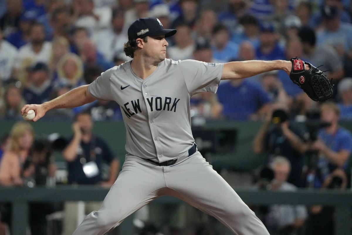 Oct 10, 2024; Kansas City, Missouri, USA; New York Yankees pitcher Gerrit Cole (45) throws a pitch during the first inning against the Kansas City Royals during game four of the ALDS for the 2024 MLB Playoffs at Kauffman Stadium. Mandatory Credit: Denny Medley-Imagn Images