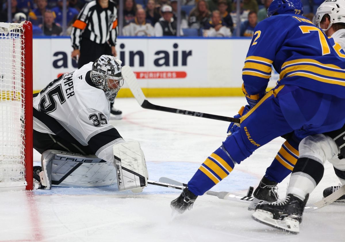 Oct 10, 2024; Buffalo, New York, USA;  Los Angeles Kings goaltender Darcy Kuemper (35) makes a stick save during the second period against the Buffalo Sabres at KeyBank Center. Mandatory Credit: Timothy T. Ludwig-Imagn Images