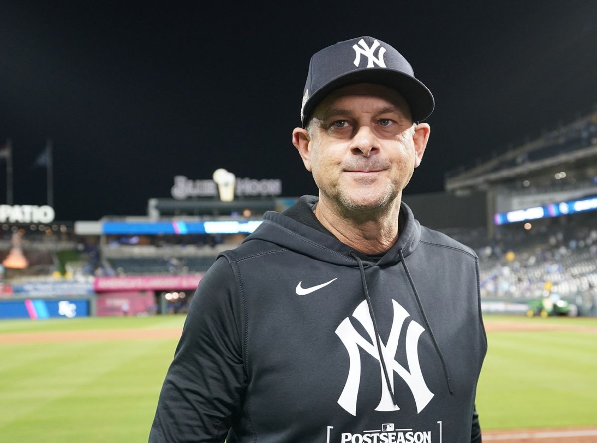 Oct 10, 2024; Kansas City, Missouri, USA; New York Yankees manager Aaron Boone (17) smiles following a win over the Kansas City Royals during game four of the ALDS for the 2024 MLB Playoffs at Kauffman Stadium. Mandatory Credit: Denny Medley-Imagn Images