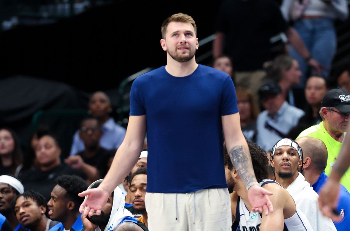 Oct 10, 2024; Dallas, Texas, USA;  Dallas Mavericks guard Luka Doncic reacts on the bench during the first half against the Utah Jazz at American Airlines Center. Mandatory Credit: Kevin Jairaj-Imagn Images