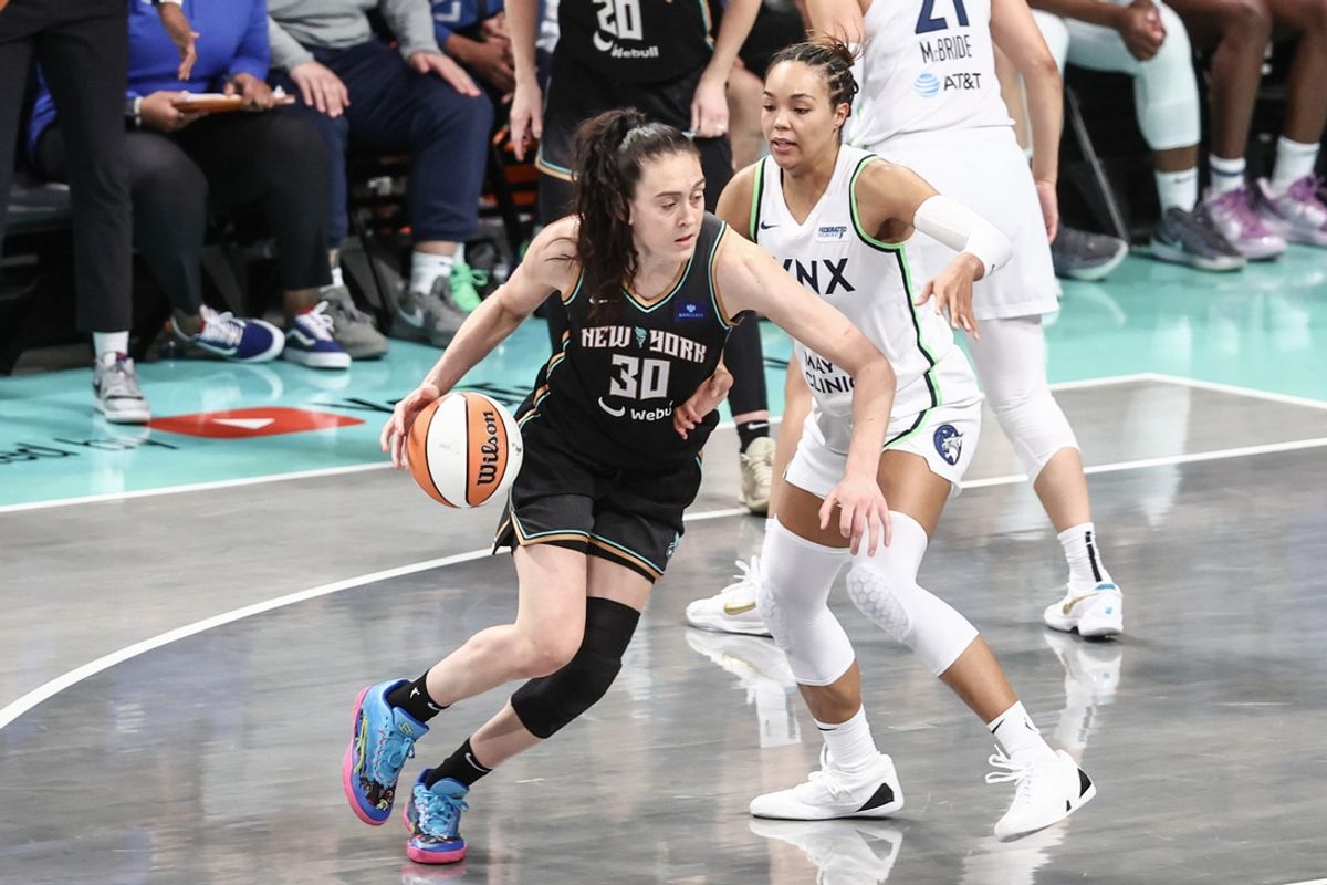 Oct 10, 2024; Brooklyn, New York, USA; New York Liberty forward Breanna Stewart (30) controls the ball as Minnesota Lynx forward Napheesa Collier (24) defends in overtime at Barclays Center. Mandatory Credit: Wendell Cruz-Imagn Images