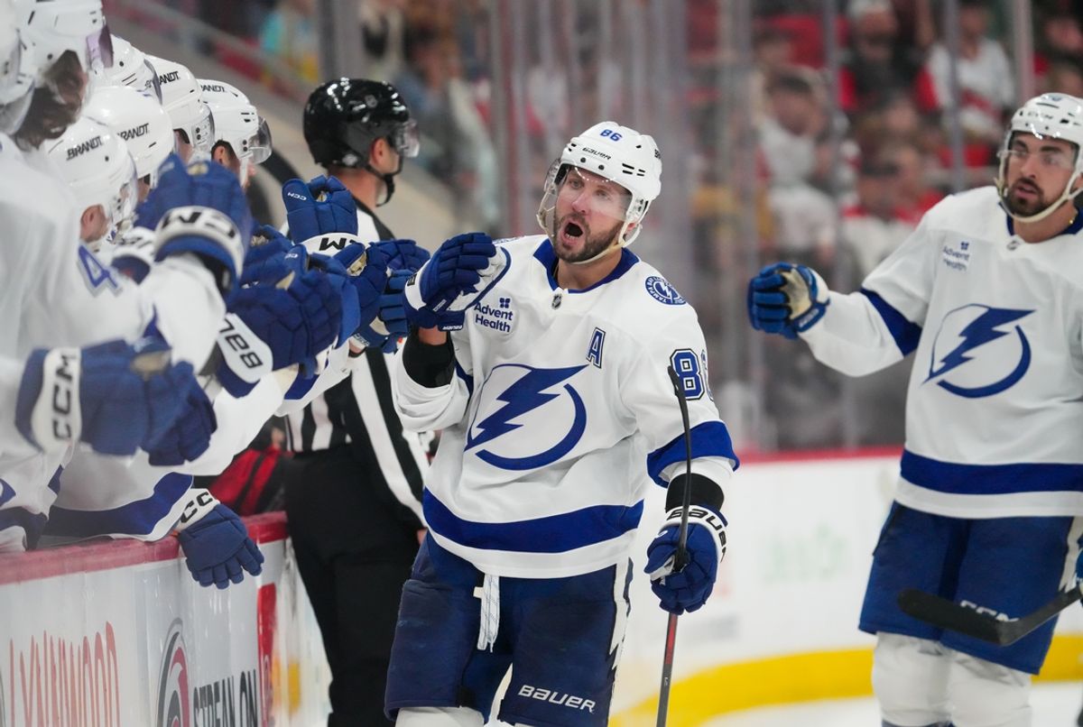 Oct 11, 2024; Raleigh, North Carolina, USA;  Tampa Bay Lightning right wing Nikita Kucherov (86) celebrates his goal against the Carolina Hurricanes during the third period at PNC Arena. Mandatory Credit: James Guillory-Imagn Images