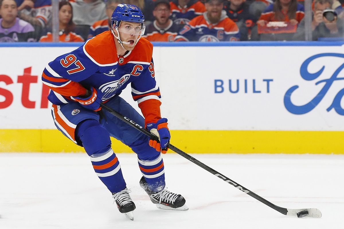 Oct 9, 2024; Edmonton, Alberta, CAN; Edmonton Oilers forward Connor McDavid (97) looks to make a pass against the Winnipeg Jets at Rogers Place. Mandatory Credit: Perry Nelson-Imagn Images