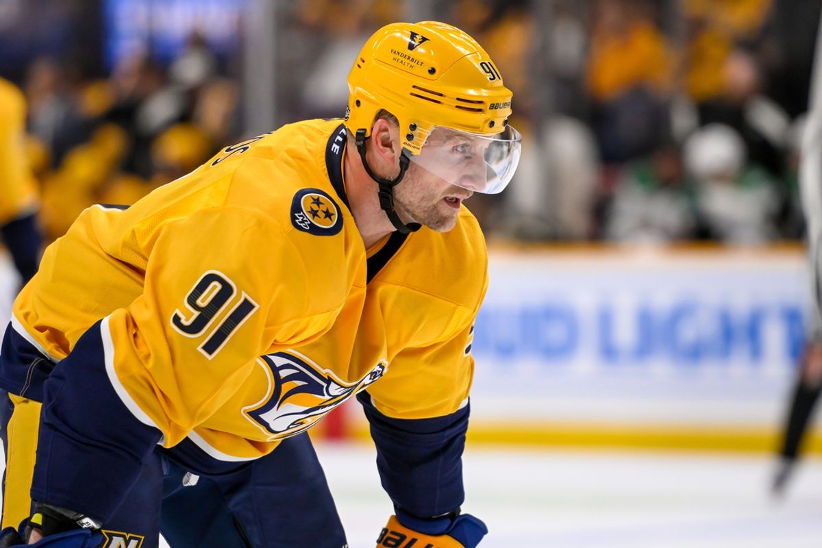 Oct 10, 2024; Nashville, Tennessee, USA;   Nashville Predators center Steven Stamkos (91) awaits the face off against the Dallas Stars during the first period at Bridgestone Arena. Mandatory Credit: Steve Roberts-Imagn Images