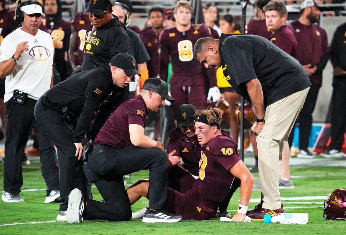 Arizona State Sun Devils quarterback Sam Leavitt (10) reacts after being injured during a tackle against the Utah Utes in the first half at Mountain America Stadium in Tempe on Oct. 11, 2024.