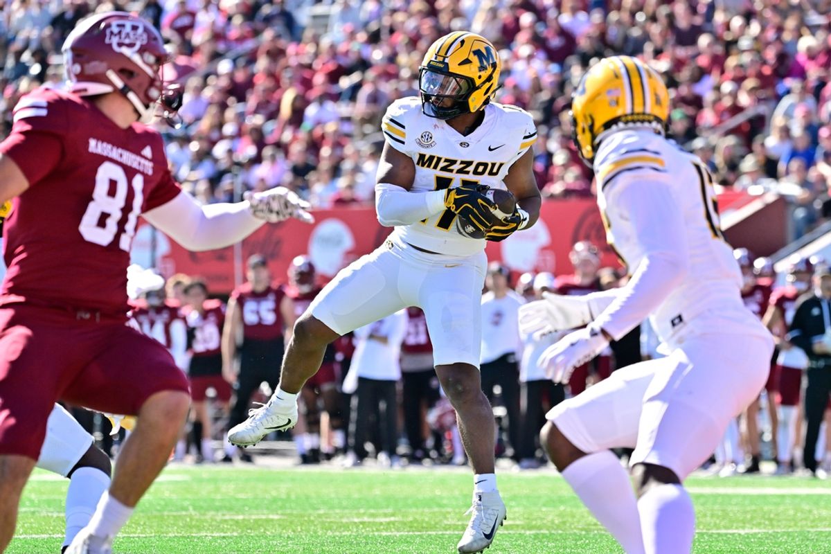 Oct 12, 2024; Amherst, Massachusetts, USA; Missouri Tigers linebacker Corey Flagg Jr. (11)  intercepts a pass during the first half against the Massachusetts Minutemen at Warren McGuirk Alumni Stadium. Mandatory Credit: Eric Canha-Imagn Images