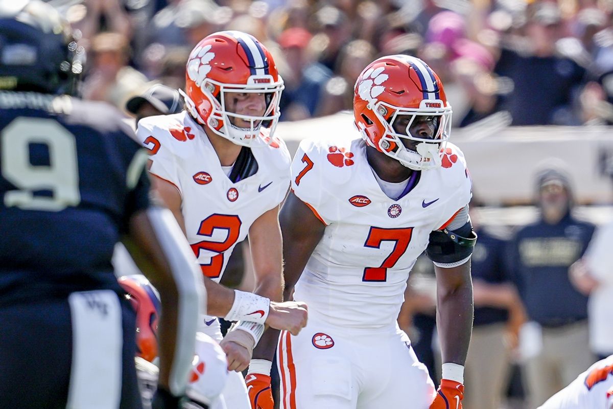 Oct 12, 2024; Winston-Salem, North Carolina, USA; Clemson Tigers running back Phil Mafah (7) readies next to quarterback Cade Klubnik (2) during the first half against the Wake Forest Demon Deacons at Allegacy Federal Credit Union Stadium. Mandatory Credit: Jim Dedmon-Imagn Images