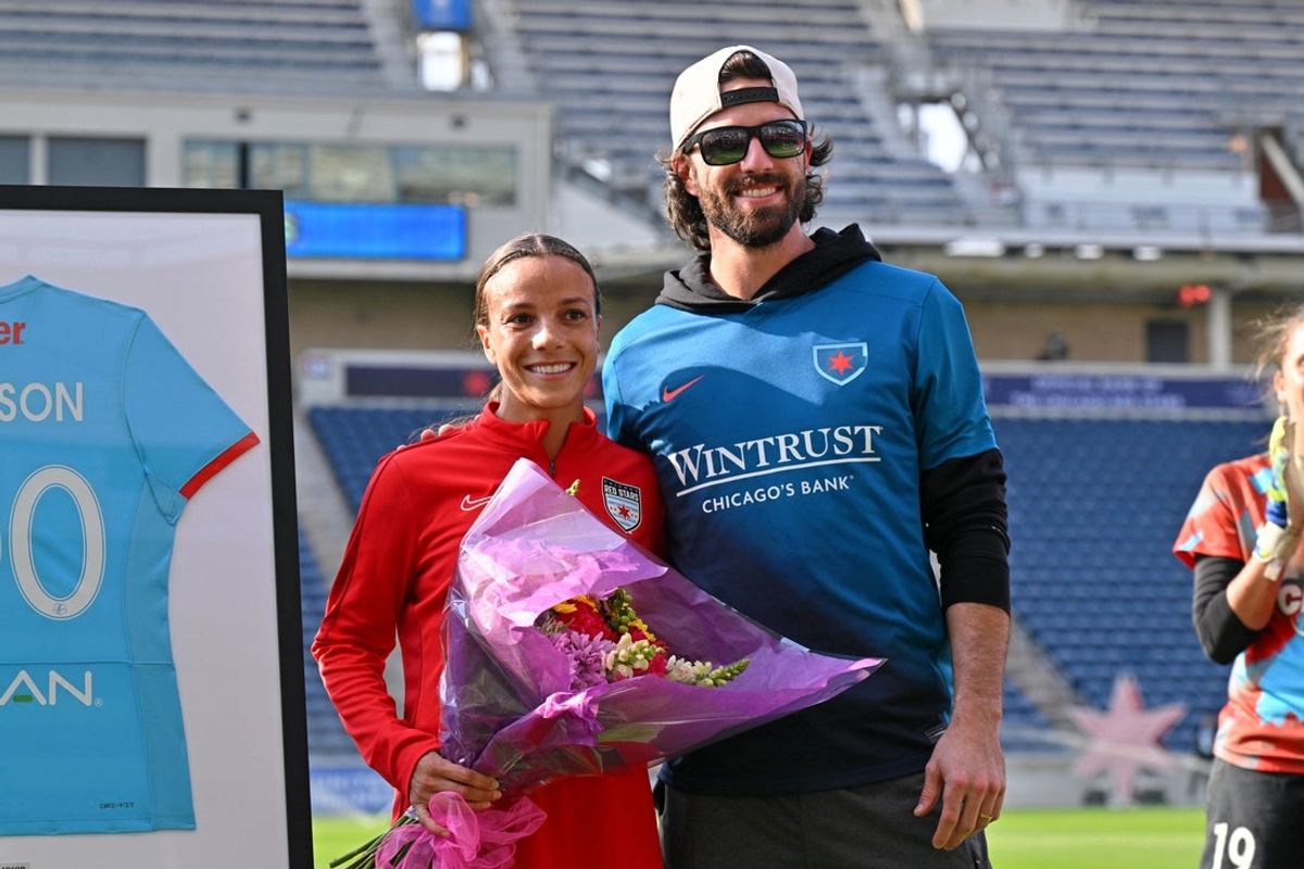 Oct 12, 2024; Bridgeview, Illinois, USA; Chicago Red Stars forward Mallory Swanson (9) with her husband Dansby Swanson as she is honored for her 100th cap before the game between the Chicago Red Stars and NJ/NY Gotham FC at SeatGeek Stadium. Mandatory Credit: Daniel Bartel-Imagn Images