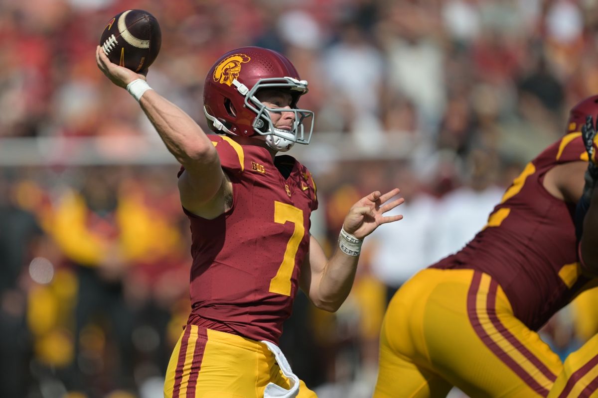 Oct 12, 2024; Los Angeles, California, USA; USC Trojans quarterback Miller Moss (7) throws a pass in the first half against the Penn State Nittany Lions United Airlines Field at Los Angeles Memorial Coliseum. Mandatory Credit: Jayne Kamin-Oncea-Imagn Images