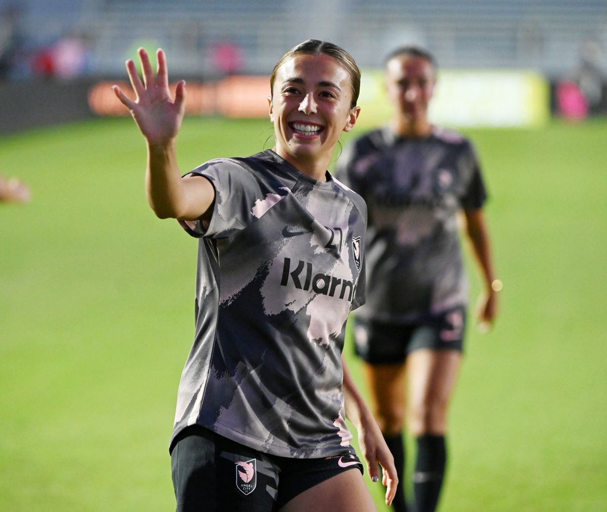 Oct 12, 2024; Cary, North Carolina, USA; Angel City FC defender Madison Curry (27) waves to fans before the game between the North Carolina Courage and Angel City FC at WakeMed Soccer Park. Mandatory Credit: Rob Kinnan-Imagn Images