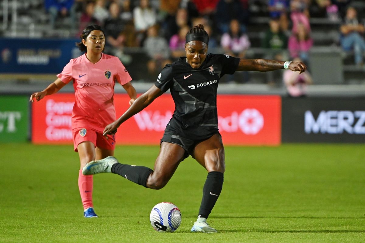 Oct 12, 2024; Cary, North Carolina, USA; Angel City FC forward Messiah Bright (24) kicks the ball against the North Carolina Courage during the first half at WakeMed Soccer Park. Mandatory Credit: Rob Kinnan-Imagn Images