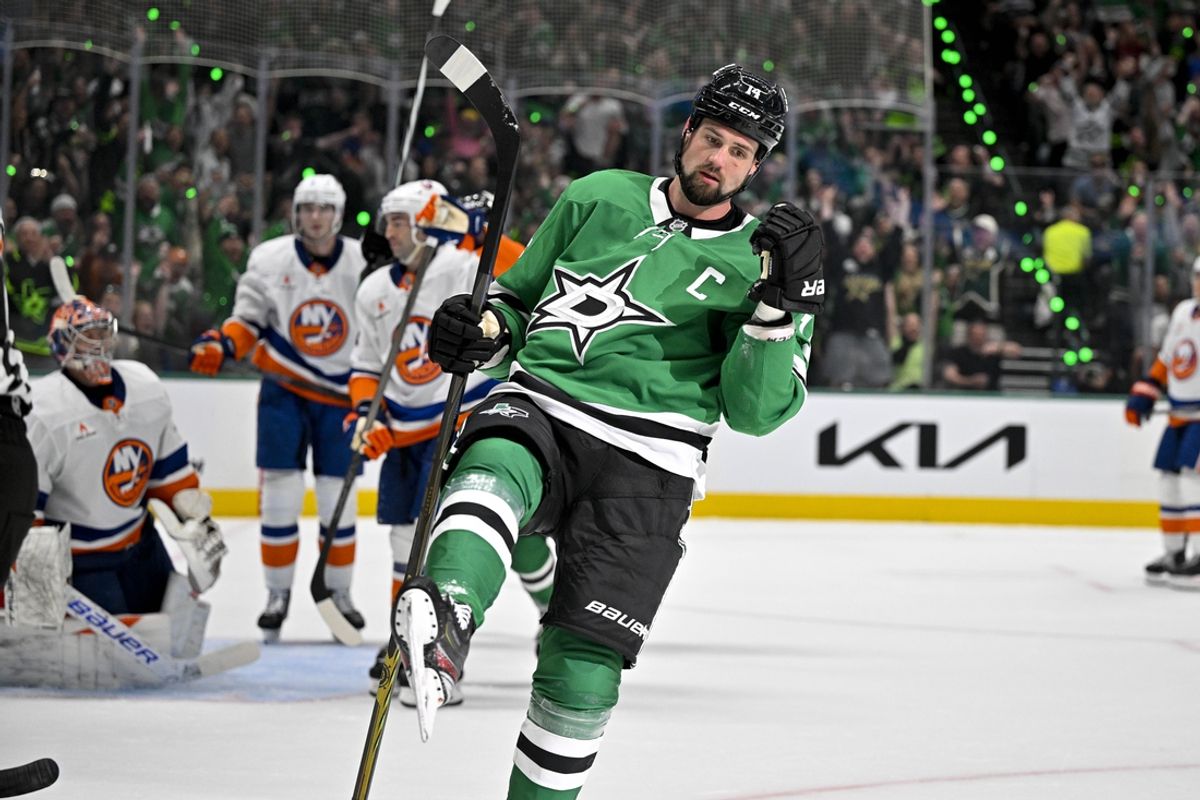 Oct 12, 2024; Dallas, Texas, USA; Dallas Stars left wing Jamie Benn (14) celebrates after he scores a goal against the New York Islanders during the second period at the American Airlines Center. Mandatory Credit: Jerome Miron-Imagn Images