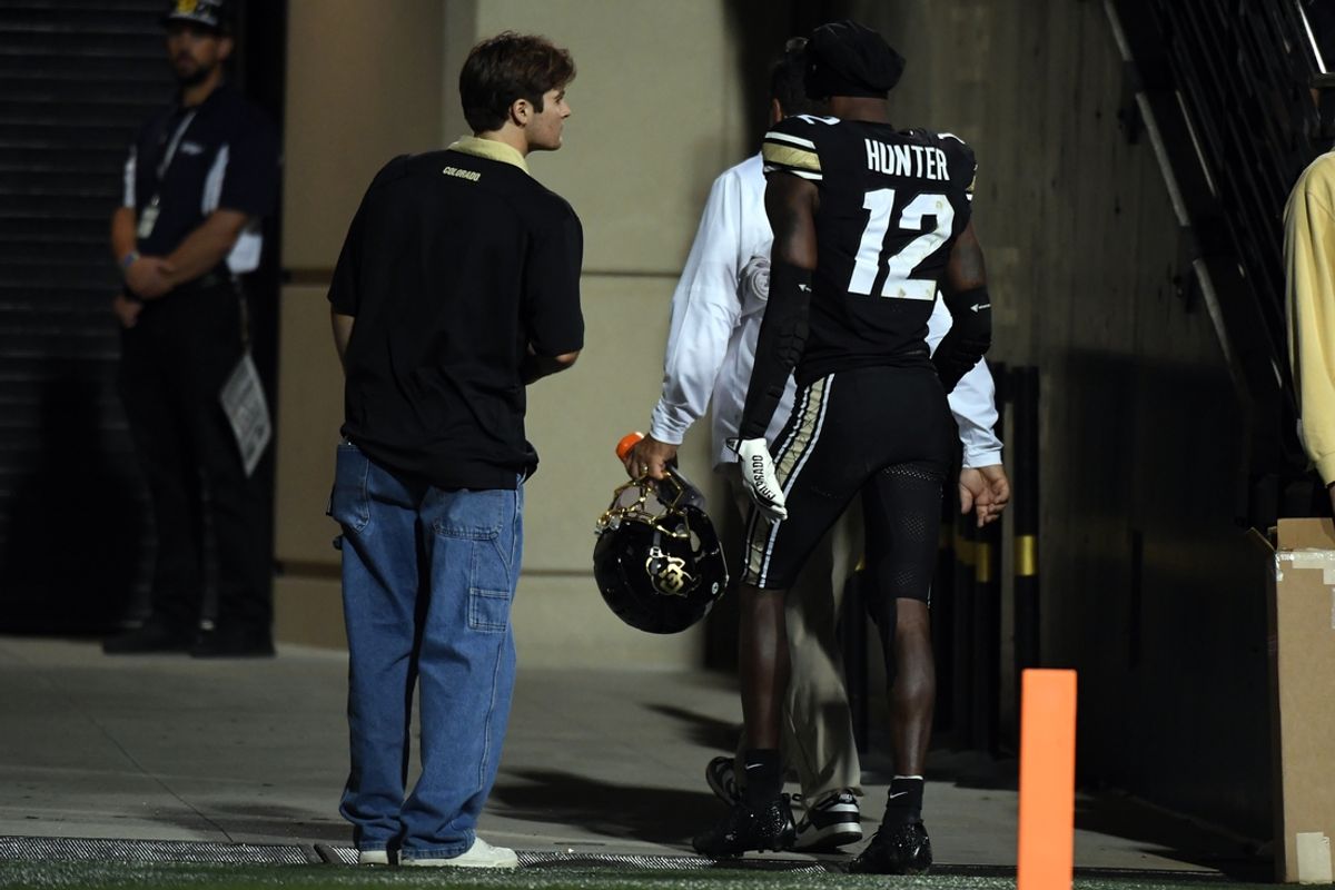 Oct 12, 2024; Boulder, Colorado, USA; Colorado Buffaloes wide receiver Travis Hunter (12) leaves the field during the second quarter against the Kansas State Wildcats at Folsom Field. Mandatory Credit: Christopher Hanewinckel-Imagn Images