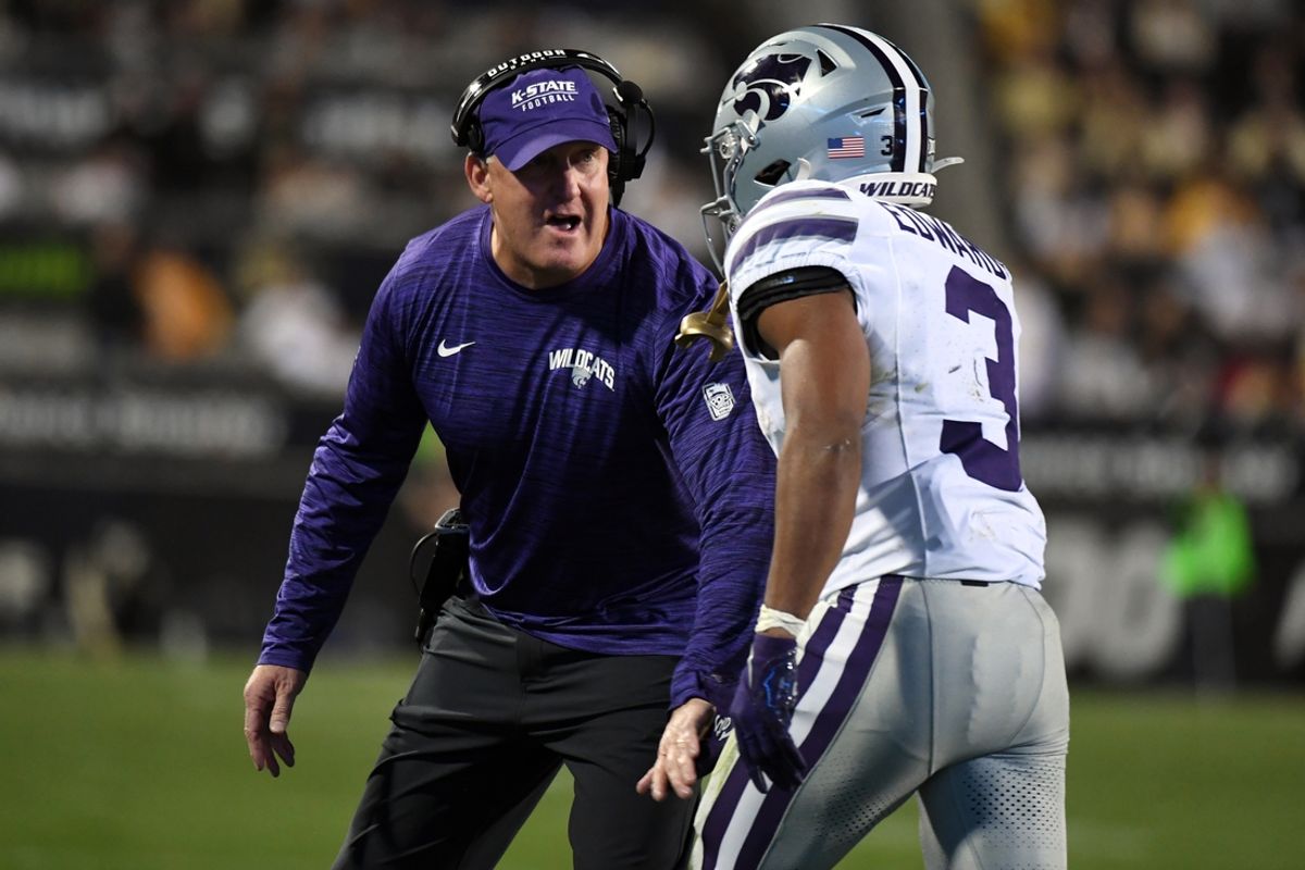 Oct 12, 2024; Boulder, Colorado, USA; Kansas State Wildcats running back Dylan Edwards (3) celebrates with head coach Chris Klieman after a touchdown during the first half against the Colorado Buffaloes at Folsom Field. Mandatory Credit: Christopher Hanewinckel-Imagn Images