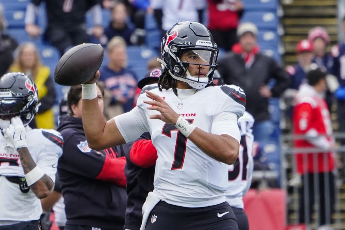 Oct 13, 2024; Foxborough, Massachusetts, USA; Houston Texans quarterback C.J. Stroud (7) warms up prior to the game against the New England Patriots at Gillette Stadium. Mandatory Credit: Gregory Fisher-Imagn Images