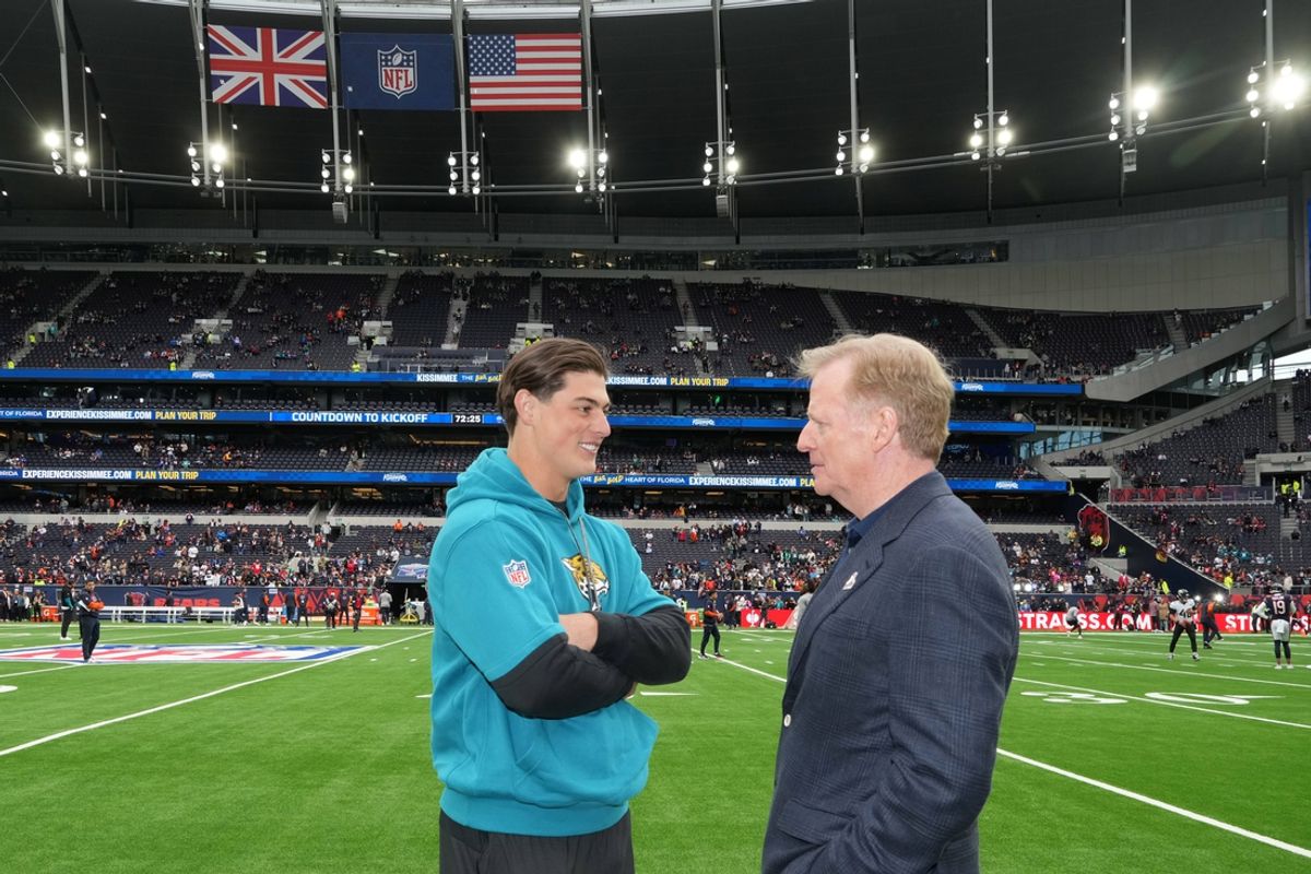 Oct 13, 2024; London, United Kingdom; NFL commissioner Roger Goodell (right) talks with Jacksonville Jaguars wide receiver Louis Rees-Zammit during an NFL International Series game at Tottenham Hotspur Stadium. Mandatory Credit: Kirby Lee-Imagn Images