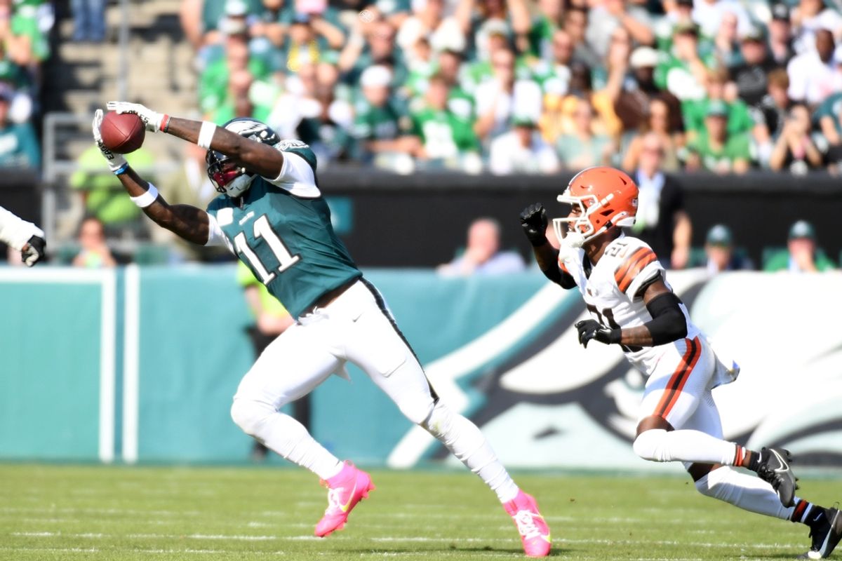 Oct 13, 2024; Philadelphia, Pennsylvania, USA; Philadelphia Eagles wide receiver A.J. Brown (11) makes a catch against Cleveland Browns cornerback Denzel Ward (21) during the second quarter at Lincoln Financial Field. Mandatory Credit: Eric Hartline-Imagn Images