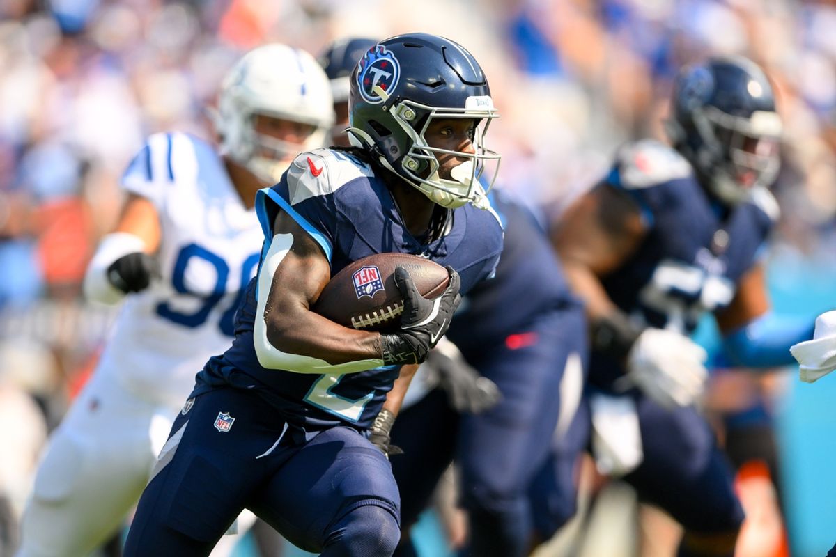 Oct 13, 2024; Nashville, Tennessee, USA;  Tennessee Titans running back Tyjae Spears (2) runs the ball against the Indianapolis Colts during the first half at Nissan Stadium. Mandatory Credit: Steve Roberts-Imagn Images