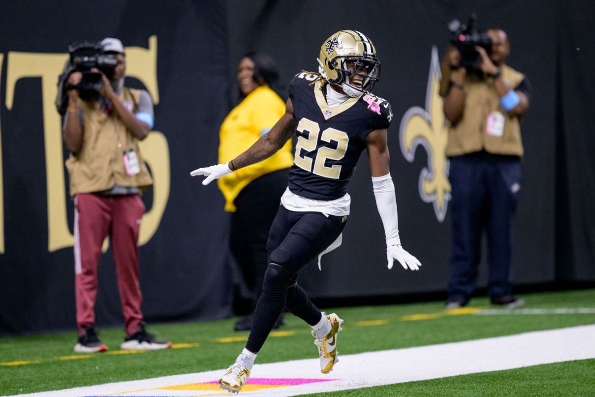 Oct 13, 2024; New Orleans, Louisiana, USA; New Orleans Saints wide receiver Rashid Shaheed (22) returns a punt for a touchdown during the second quarter against the Tampa Bay Buccaneers at Caesars Superdome. Mandatory Credit: Matthew Hinton-Imagn Images