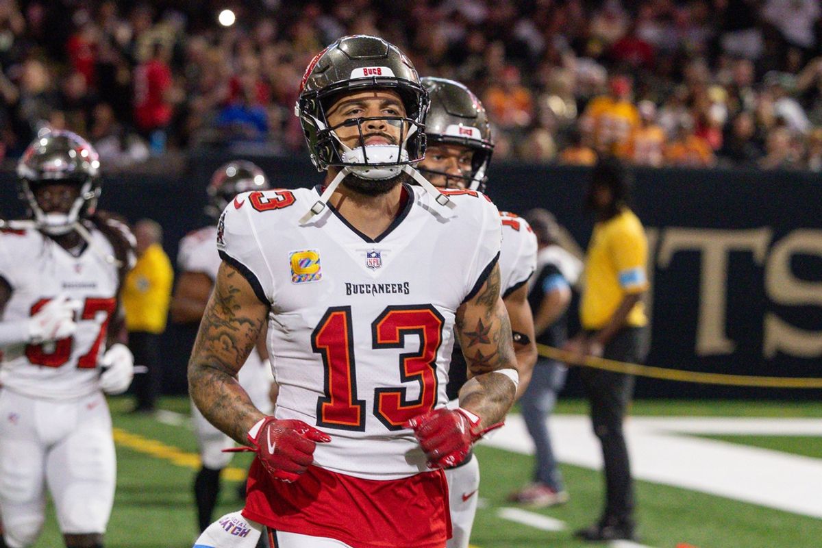 Oct 13, 2024; New Orleans, Louisiana, USA;  Tampa Bay Buccaneers wide receiver Mike Evans (13) runs on the field agains the New Orleans Saints during the first half at Caesars Superdome. Mandatory Credit: Stephen Lew-Imagn Images