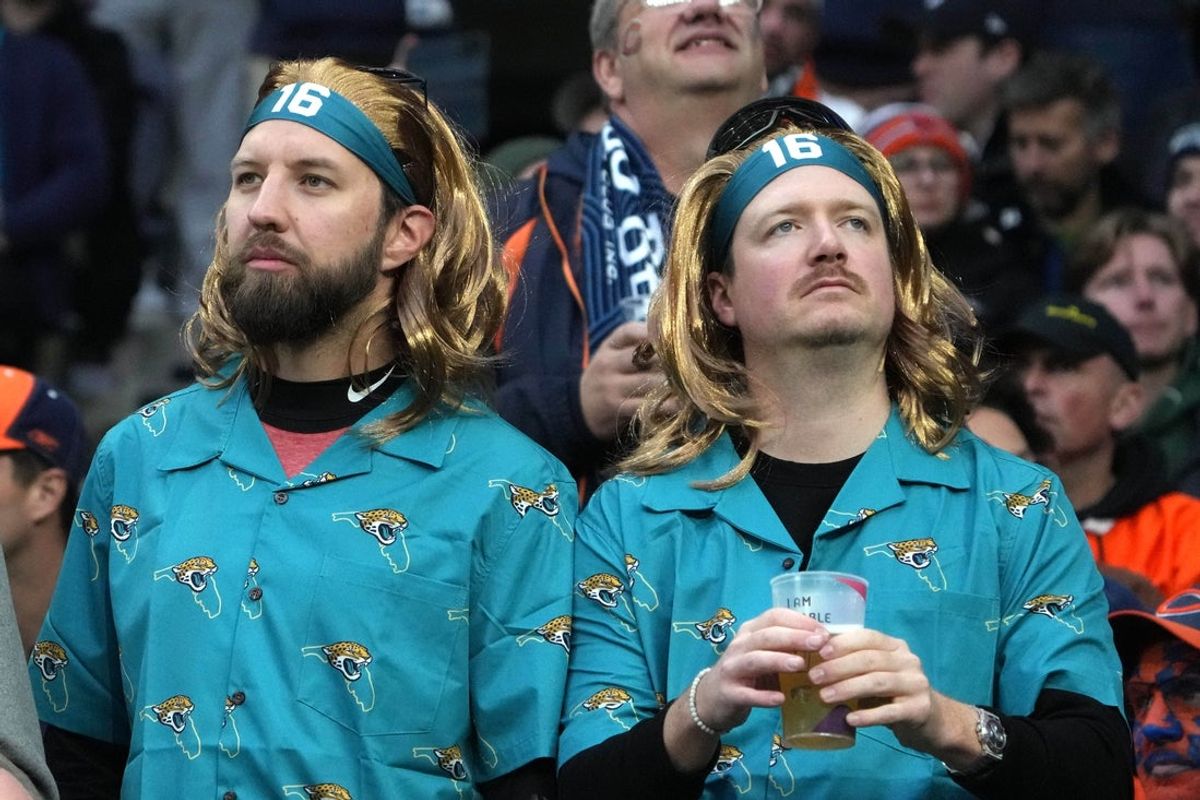Oct 13, 2024; London, United Kingdom; Fans of Jacksonville Jaguars quarterback Trevor Lawrence (16) watch in the second half during an NFL International Series game against the Jacksonville Jaguars at Tottenham Hotspur Stadium. Mandatory Credit: Kirby Lee-Imagn Images