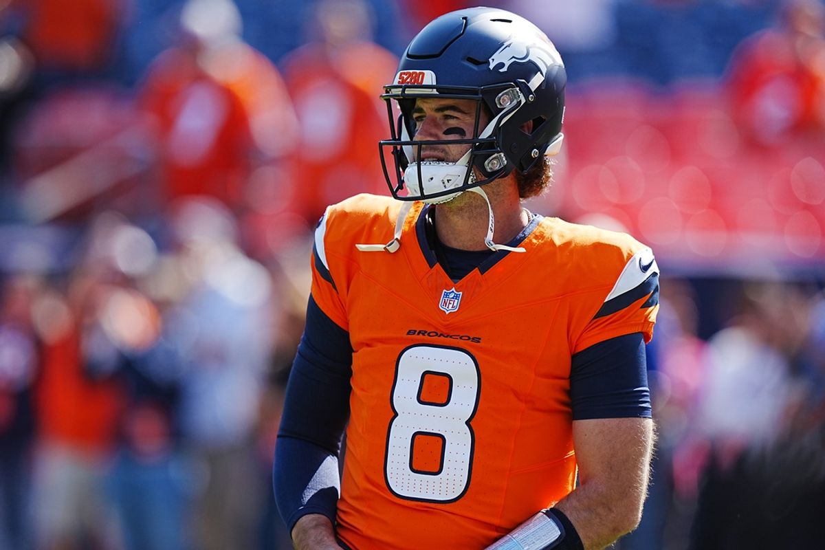 Oct 13, 2024; Denver, Colorado, USA; Denver Broncos quarterback Jarrett Stidham (8) warms up before the game against the Los Angeles Chargers at Empower Field at Mile High. Mandatory Credit: Ron Chenoy-Imagn Images