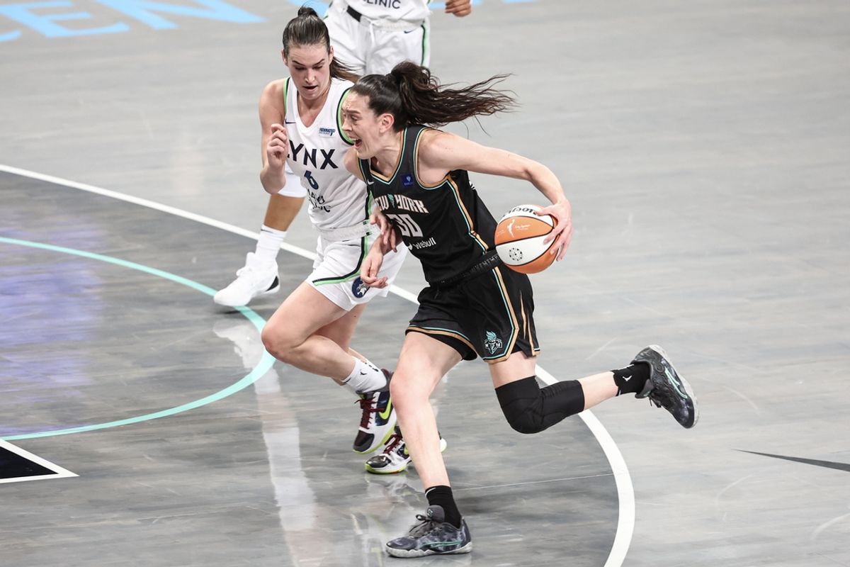 Oct 13, 2024; Brooklyn, New York, USA; New York Liberty forward Breanna Stewart (30) drives past Minnesota Lynx forward Bridget Carleton (6) in the second quarter during game two of the 2024 WNBA Finals at Barclays Center. Mandatory Credit: Wendell Cruz-Imagn Images