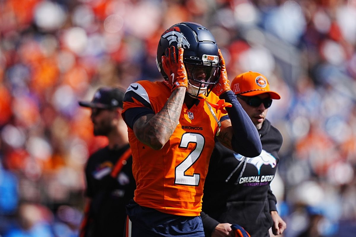 Oct 13, 2024; Denver, Colorado, USA; Denver Broncos cornerback Pat Surtain II (2) leaves the field in the first quarter against the Los Angeles Chargers at Empower Field at Mile High. Mandatory Credit: Ron Chenoy-Imagn Images