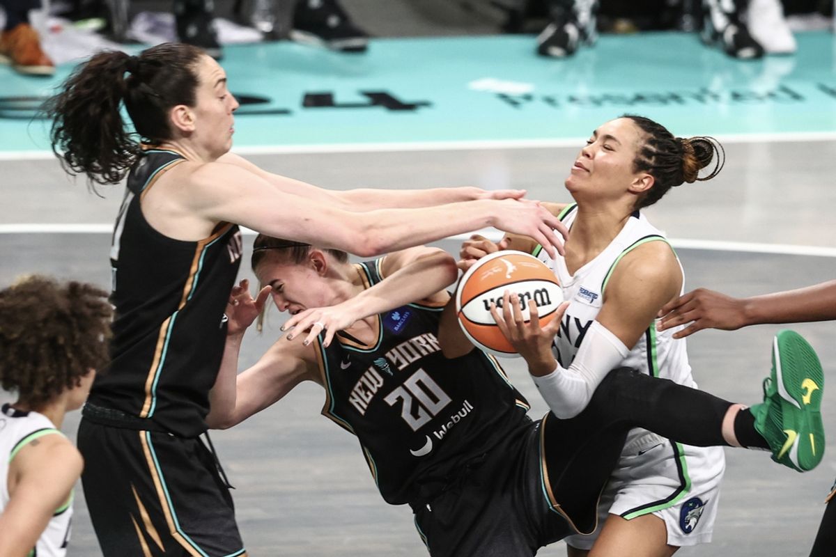 Oct 13, 2024; Brooklyn, New York, USA; New York Liberty forward Breanna Stewart (30), guard Sabrina Ionescu (20) and Minnesota Lynx forward Napheesa Collier (24) fight for a loose ball during game two of the 2024 WNBA Finals at Barclays Center. Mandatory Credit: Wendell Cruz-Imagn Images
