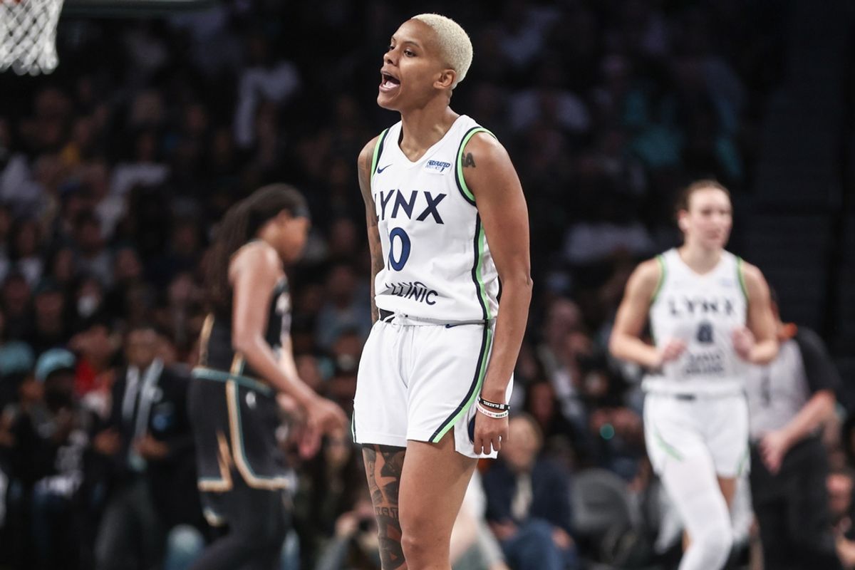 Oct 13, 2024; Brooklyn, New York, USA; Minnesota Lynx guard Courtney Williams (10) celebrates after making a three point shot in the third quarter against the New York Liberty during game two of the 2024 WNBA Finals at Barclays Center. Mandatory Credit: Wendell Cruz-Imagn Images