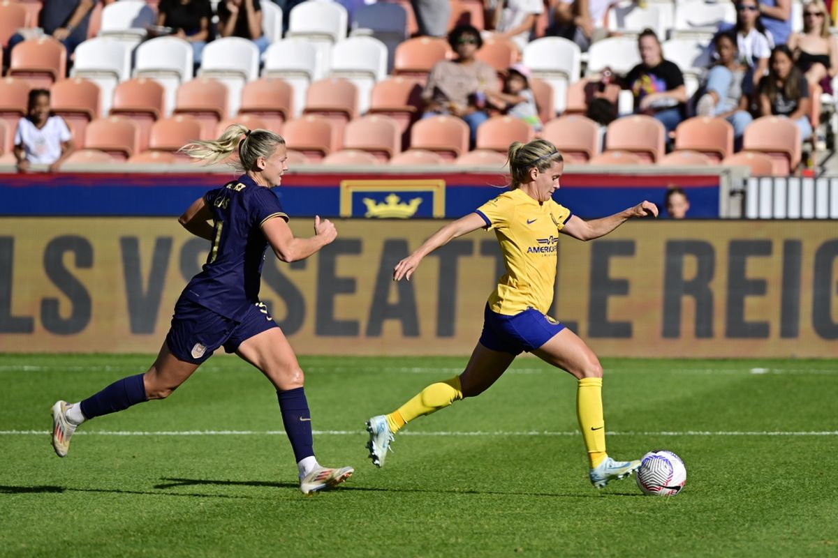 Oct 13, 2024; Sandy, Utah, USA; Utah Royals FC forward Cloe Lacasse (24) controls the ball against Seattle Reign FC defender Hanna Glas (31) in the first half at America First Field. Mandatory Credit: Christopher Creveling-Imagn Images
