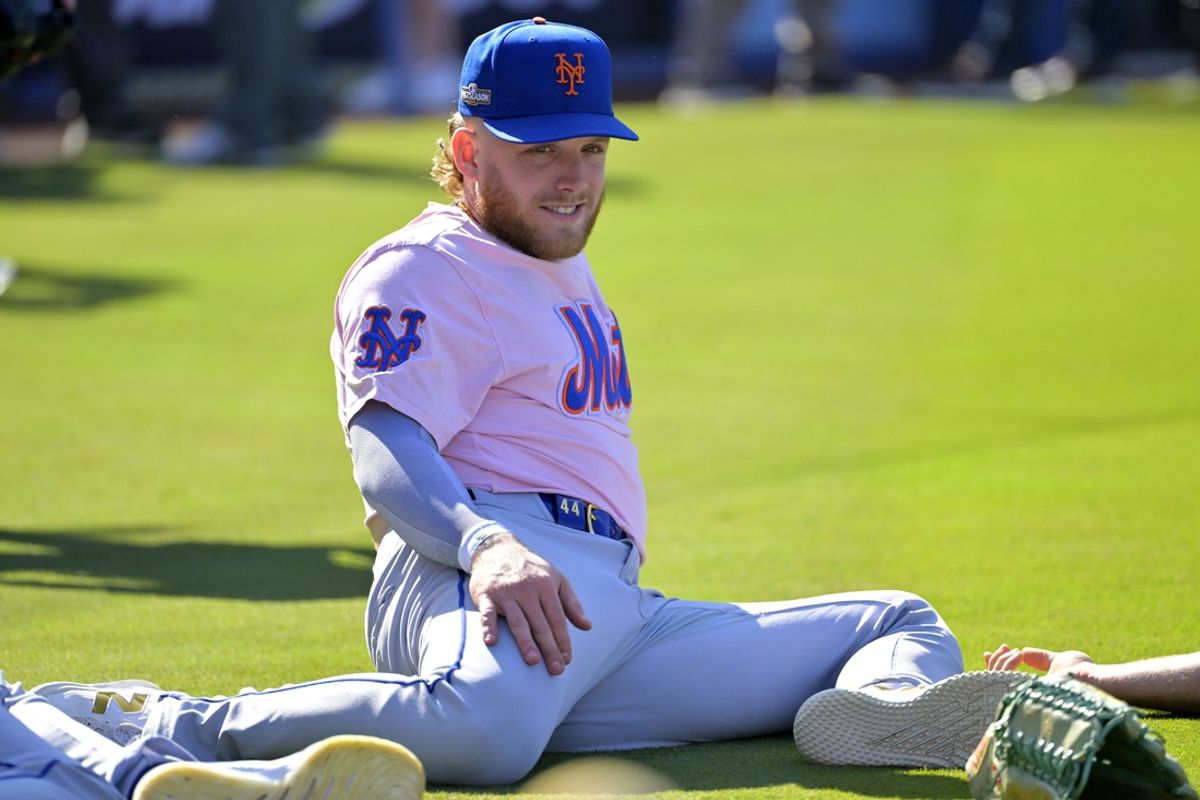 Oct 13, 2024; Los Angeles, California, USA; New York Mets outfielder Harrison Bader (44) stretches before game one of the NLCS for the 2024 MLB Playoffs at Dodger Stadium. Mandatory Credit: Jayne Kamin-Oncea-Imagn Images