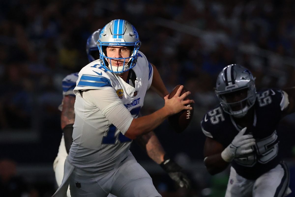 Oct 13, 2024; Arlington, Texas, USA;  Detroit Lions quarterback Jared Goff (16) looks to run during the second half against the Dallas Cowboys at AT&T Stadium. Mandatory Credit: Kevin Jairaj-Imagn Images