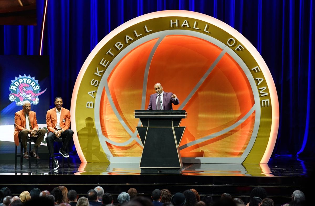 Oct 13, 2024; Uncasville, Conn, USA; Class of 2024 inductee Vince Carter speaks alongside presenters Julius Erving (‘93) and Tracy McGrady (‘17) during the Naismith Memorial Basketball Hall of Fame Enshrinement at Symphony Hall Springfield. Mandatory Credit: David Butler II-Imagn Images