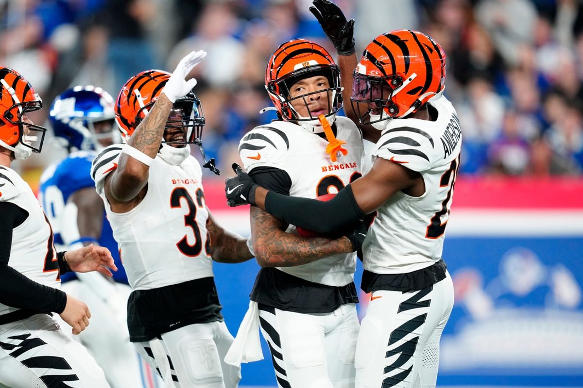 Cincinnati Bengals safety Daijahn Anthony (33) is congratulated by his teammates for preventing a New York Jets touchback after they punted to the host team, Sunday, October 13, 2024, in East Rutherford.