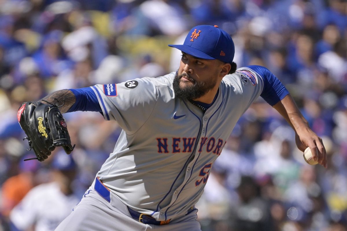 Oct 14, 2024; Los Angeles, California, USA; New York Mets pitcher Sean Manaea (59) pitches against the Los Angeles Dodgers in the first inning during game two of the NLCS for the 2024 MLB Playoffs at Dodger Stadium. Mandatory Credit: Jayne Kamin-Oncea-Imagn Images