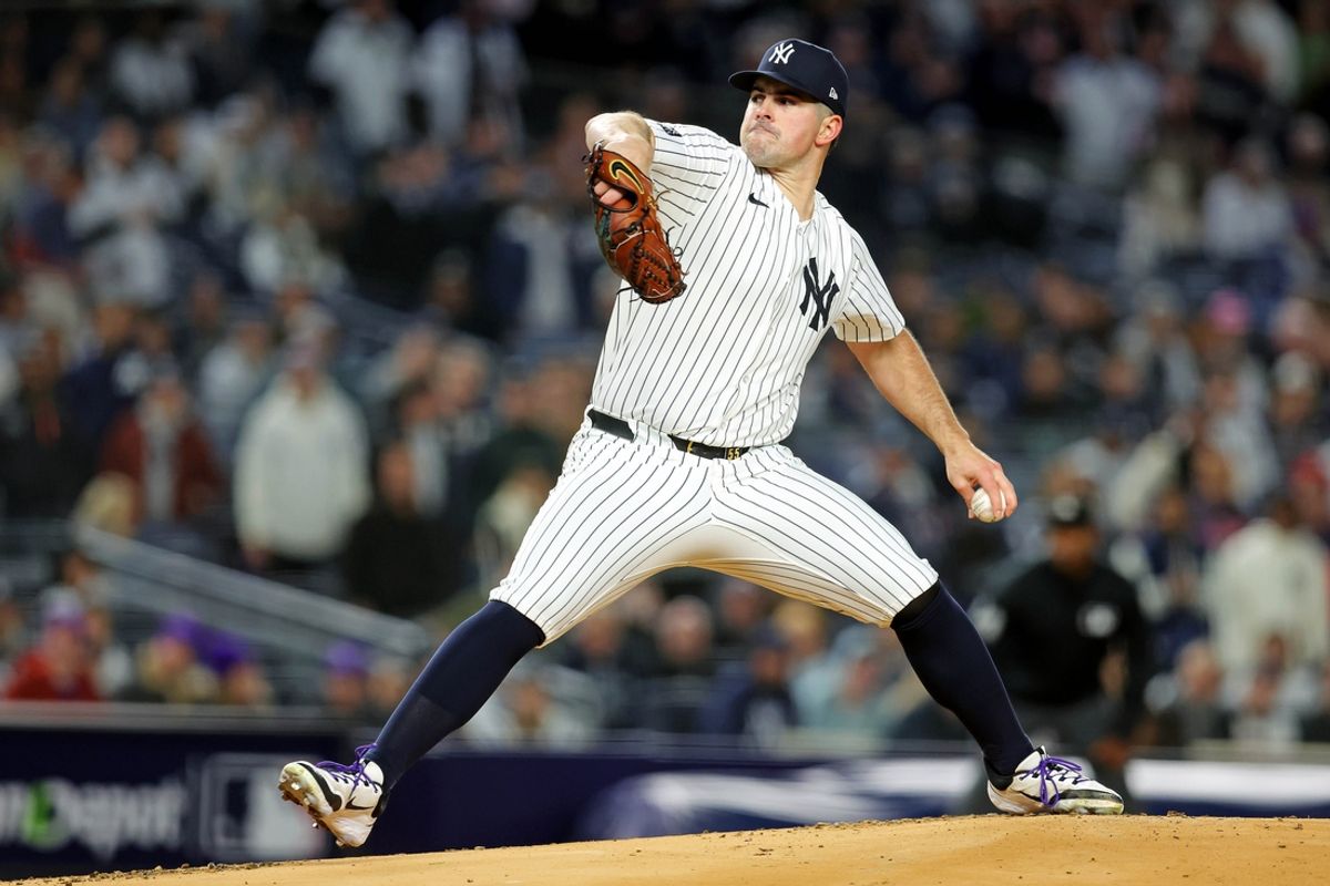 Oct 14, 2024; Bronx, New York, USA; New York Yankees pitcher Carlos Rodon (55) pitches during the first inning against the Cleveland Guardians in game one of the ALCS for the 2024 MLB Playoffs at Yankee Stadium. Mandatory Credit: Brad Penner-Imagn Images