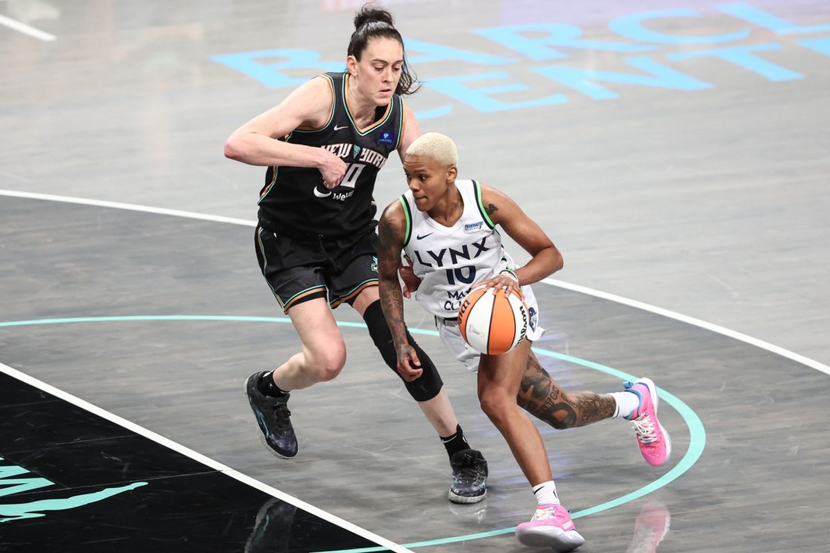 Oct 13, 2024; Brooklyn, New York, USA; Minnesota Lynx guard Courtney Williams (10) and New York Liberty forward Breanna Stewart (30) during game two of the 2024 NBA Finals at Barclays Center. Mandatory Credit: Wendell Cruz-Imagn Images