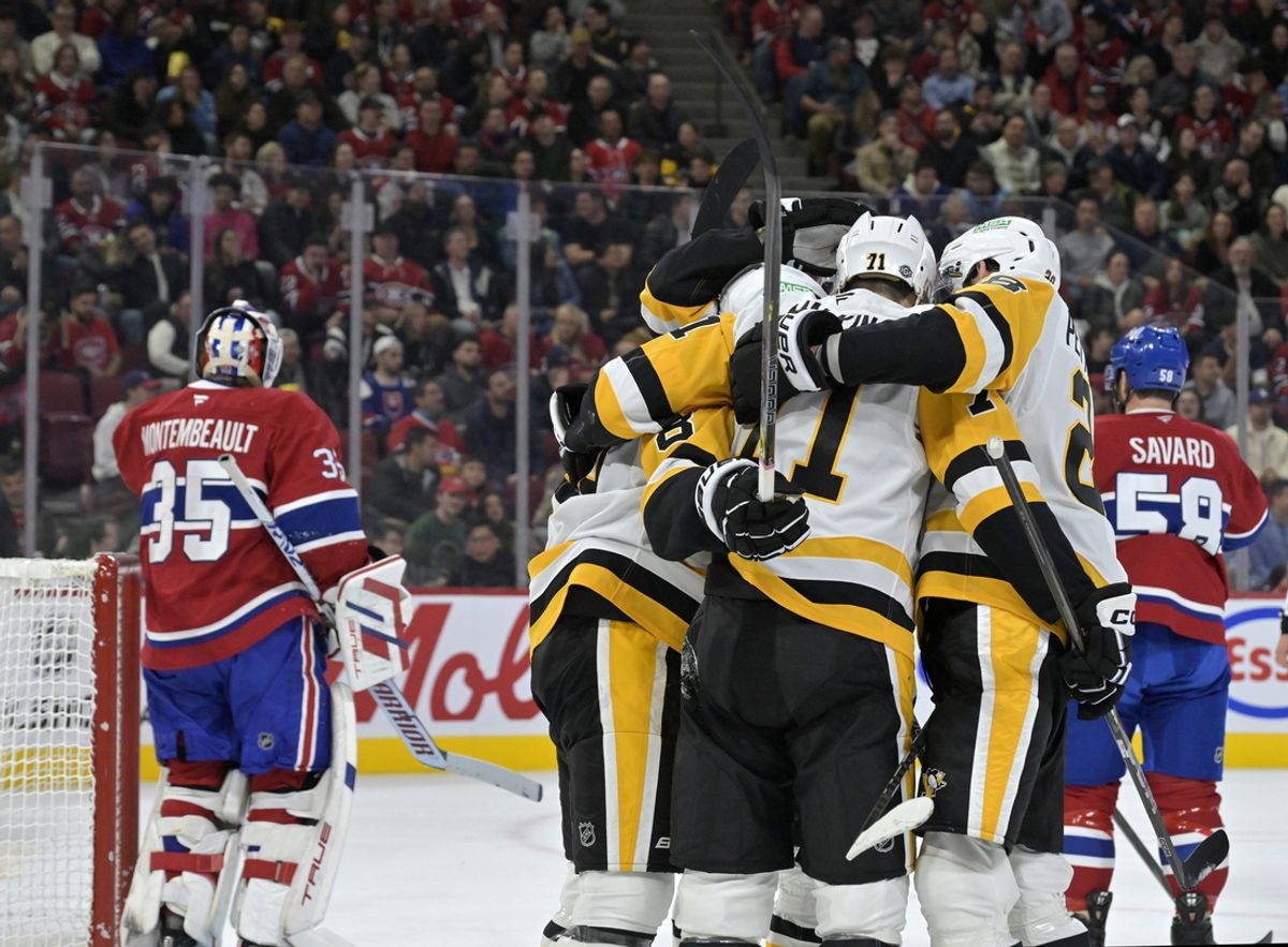 Oct 14, 2024; Montreal, Quebec, CAN; Pittsburgh Penguins forward Rickard Rakell (67) celebrates with teammates after scoring a goal against Montreal Canadiens goalie Sam Montembeault (35) during the first period at the Bell Centre. Mandatory Credit: Eric Bolte-Imagn Images