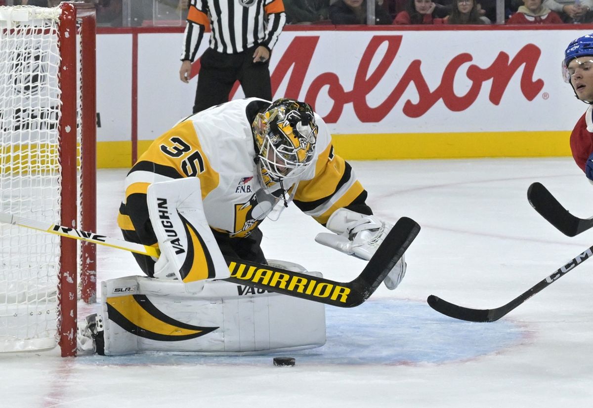 Oct 14, 2024; Montreal, Quebec, CAN; Pittsburgh Penguins goalie Tristan Jarry (35) makes a save against the Montreal Canadiens during the second period at the Bell Centre. Mandatory Credit: Eric Bolte-Imagn Images