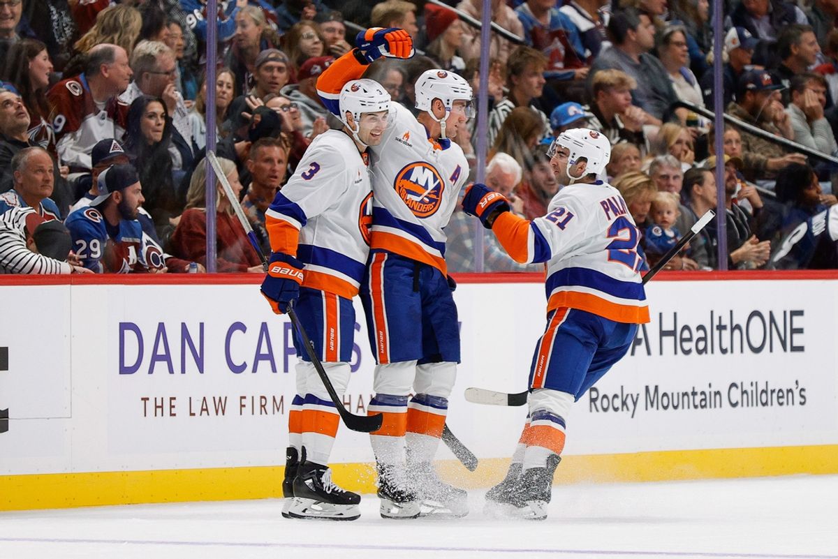 Oct 14, 2024; Denver, Colorado, USA; New York Islanders center Brock Nelson (29) celebrates his goal with defenseman Adam Pelech (3) and center Kyle Palmieri (21) in the second period against the Colorado Avalanche at Ball Arena. Mandatory Credit: Isaiah J. Downing-Imagn Images