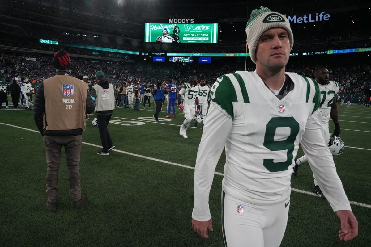 East Rutherford, NJ -- October 14, 2024 -- After missing two field goals run the second half, Greg Zuerlein of the Jets leaves the field at the end of the game. The Buffalo Bills came to MetLife Stadium to play the NY Jets. The Jets played their first game under new interim head coach Jeff Ulbrich.