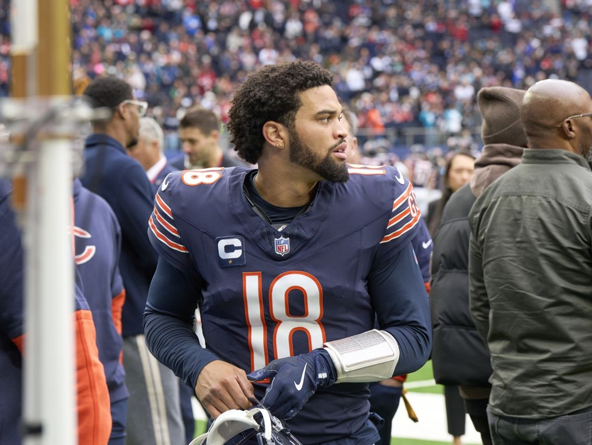 Oct 13, 2024; London, United Kingdom; Chicago Bears quarterback Caleb Williams (18) leaves the field during an NFL International Series game at Tottenham Hotspur Stadium. Mandatory Credit: Peter van den Berg-Imagn Images