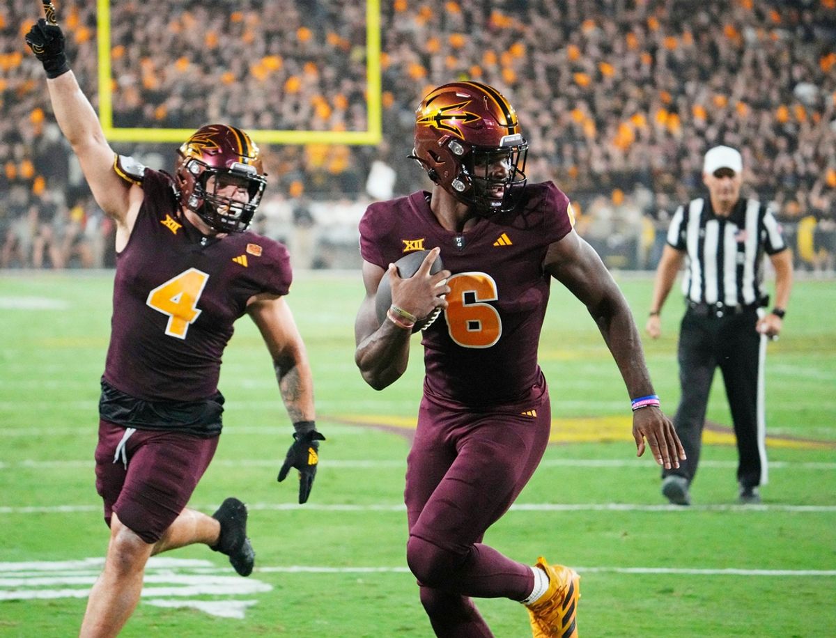 Arizona State Sun Devils quarterback Jeff Sims (6) runs for a touchdown against the Utah Utes in the first half at Mountain America Stadium in Tempe on Oct. 11, 2024.