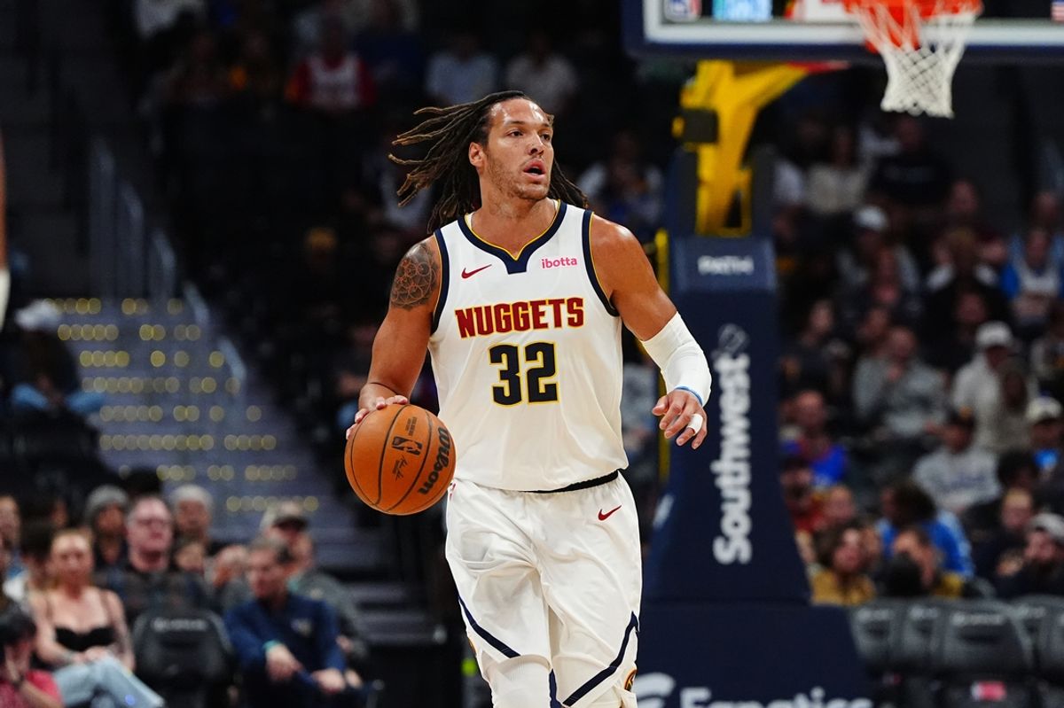 Oct 15, 2024; Denver, Colorado, USA; Denver Nuggets forward Aaron Gordon (32) during the first quarter against the Oklahoma City Thunder at Ball Arena. Mandatory Credit: Ron Chenoy-Imagn Images