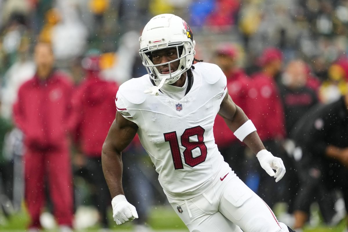 Oct 13, 2024; Green Bay, Wisconsin, USA;  Arizona Cardinals wide receiver Marvin Harrison Jr. (18) during warmups prior to the game against the Green Bay Packers at Lambeau Field. Mandatory Credit: Jeff Hanisch-Imagn Images