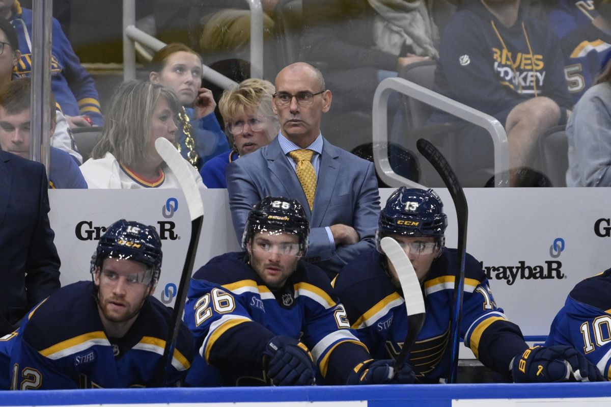 Oct 15, 2024; St. Louis, Missouri, USA; St. Louis Blues head coach Drew Bannister looks on during the third period of a hockey game against the Minnesota Wild at Enterprise Center. Mandatory Credit: Jeff Le-Imagn Images