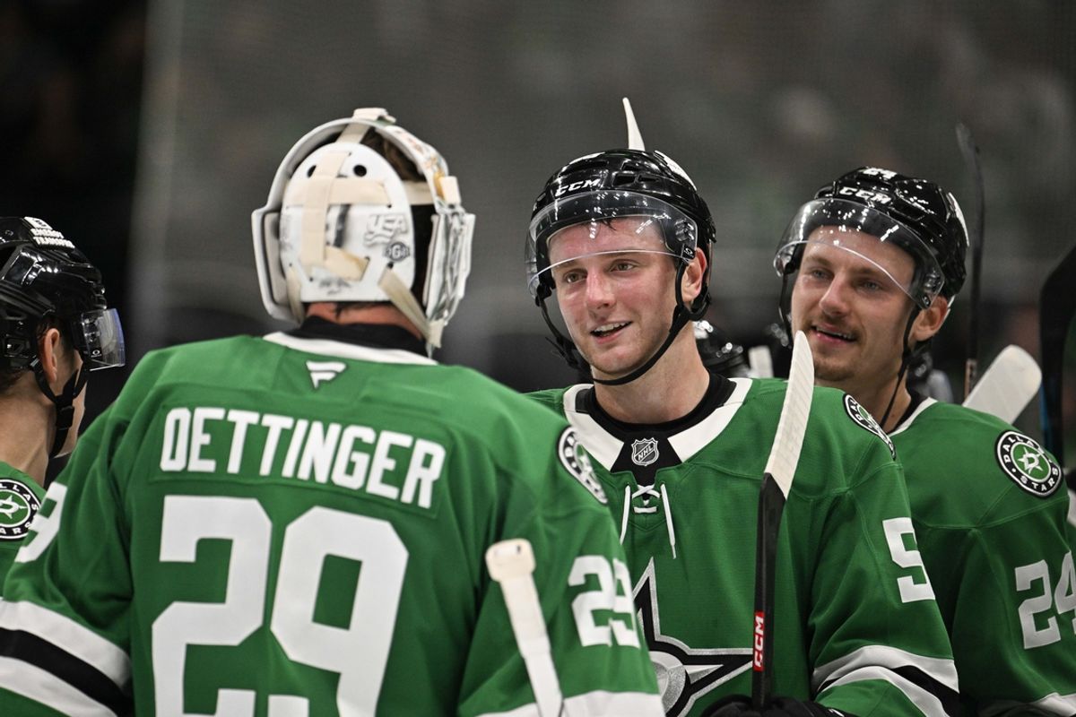 Oct 15, 2024; Dallas, Texas, USA; Dallas Stars goaltender Jake Oettinger (29) and defenseman Thomas Harley (55) and center Roope Hintz (24) celebrate the Stars victory over the San Jose Sharks at the American Airlines Center. Mandatory Credit: Jerome Miron-Imagn Images